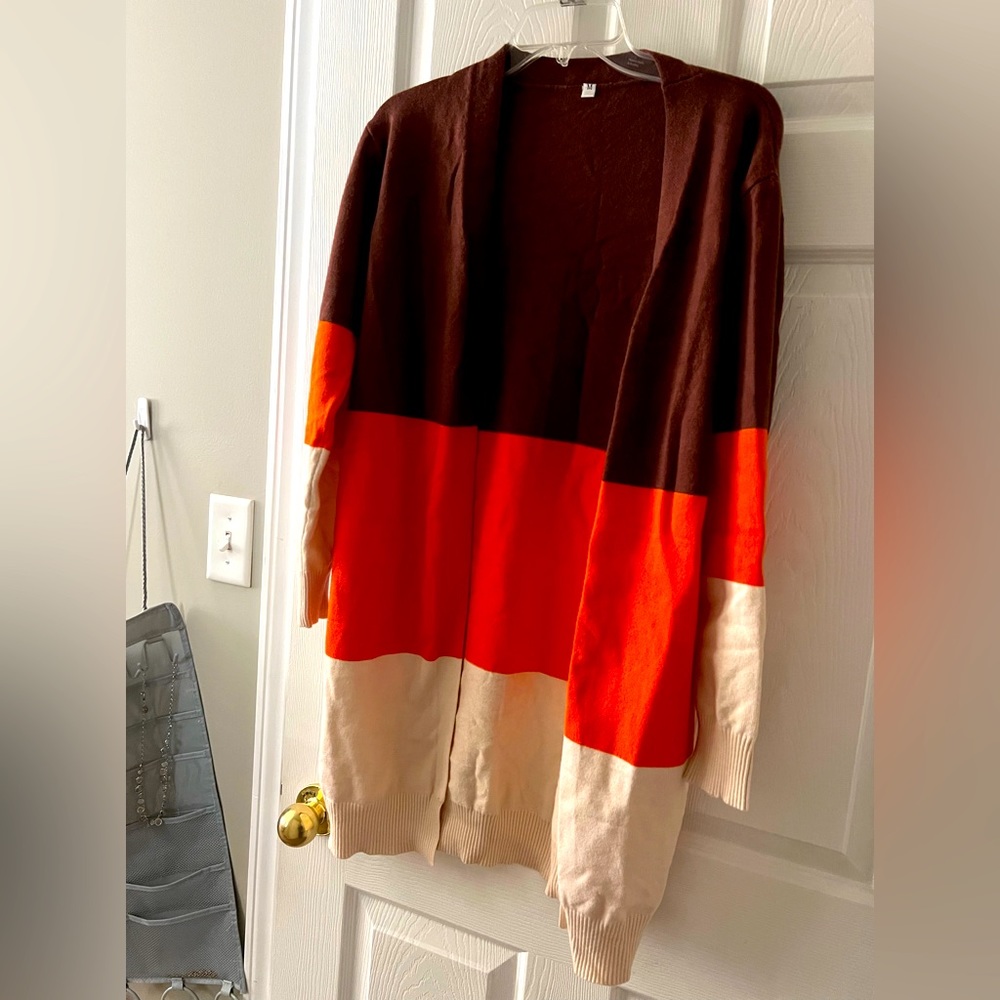 Open cardigan, no bottoms